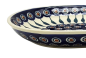 Preview: Bunzlauer Servierplatte oval groß Dekor Pfauenauge seitlicher Ausschnitt